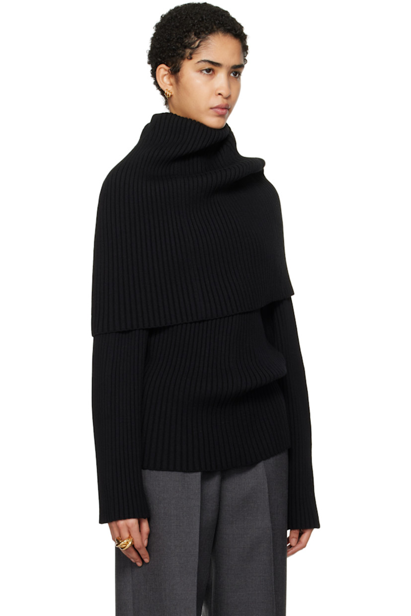 Rib-knit extrafine merino wool turtleneck.

· Cape-style foldover collar
· Extended cuffs

Supplier color: Black