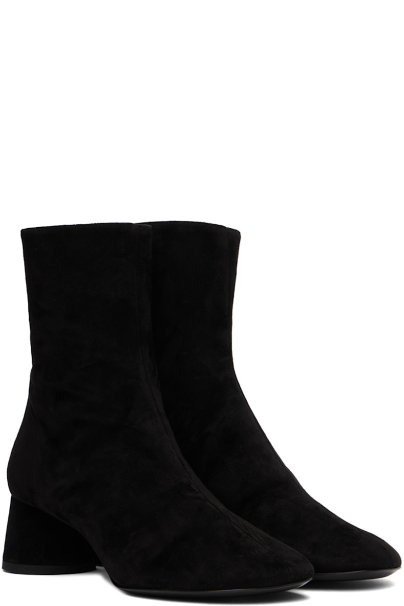 Ankle-high goatskin suede boots in black.

· Zip closure at heel
· Grained leather lining
· Covered cylindrical heel with rubber injection
· Logo hardware at polished calfskin sole
· Heel: H2"

Supplier color: Black
