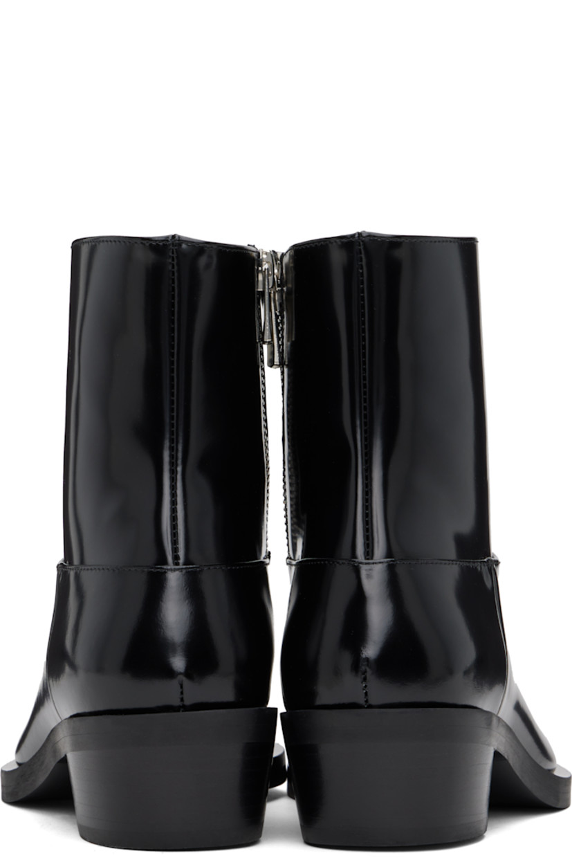Ankle-high polished calfskin boots in black. 

· Pointed square toe 
· Zip closure at inner side
· Buffed leather lining 
· Stacked leather midsole
· Stacked leather block heel with rubber injection 
· Leather sole 
· Heel: H2"

Supplier color: Black