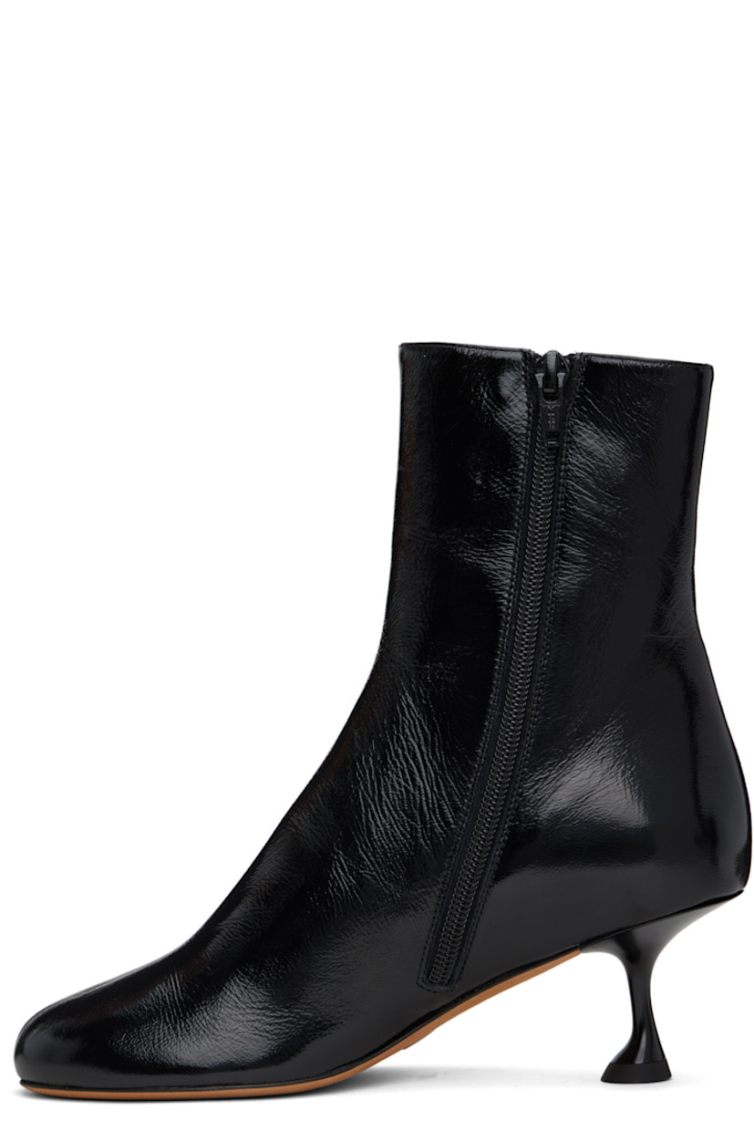 Ankle-high crackled nappa lambskin boots in black. 

· Zip closure at inner side
· Grained leather lining
· Covered spool heel with rubber injection
· Suede sole 
· Heel: H2.25"

Supplier color: Black