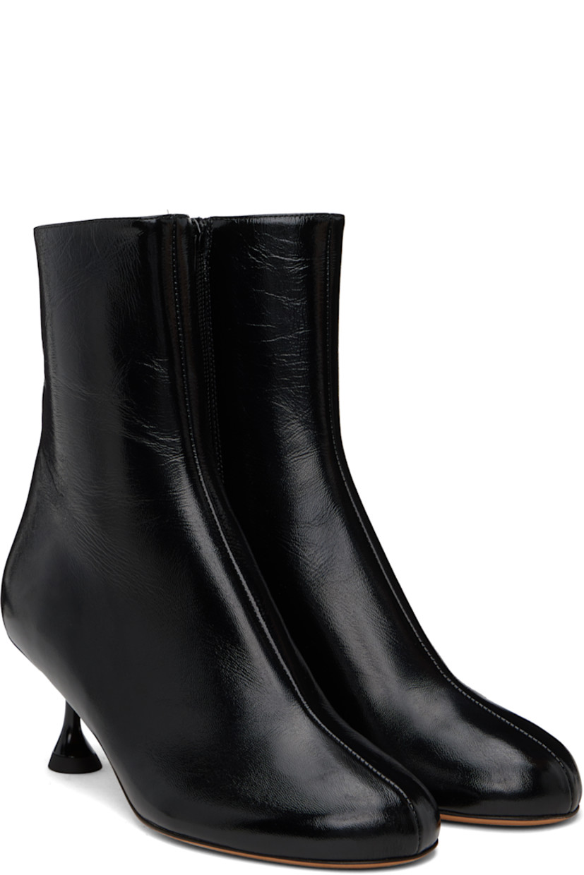 Ankle-high crackled nappa lambskin boots in black. 

· Zip closure at inner side
· Grained leather lining
· Covered spool heel with rubber injection
· Suede sole 
· Heel: H2.25"

Supplier color: Black
