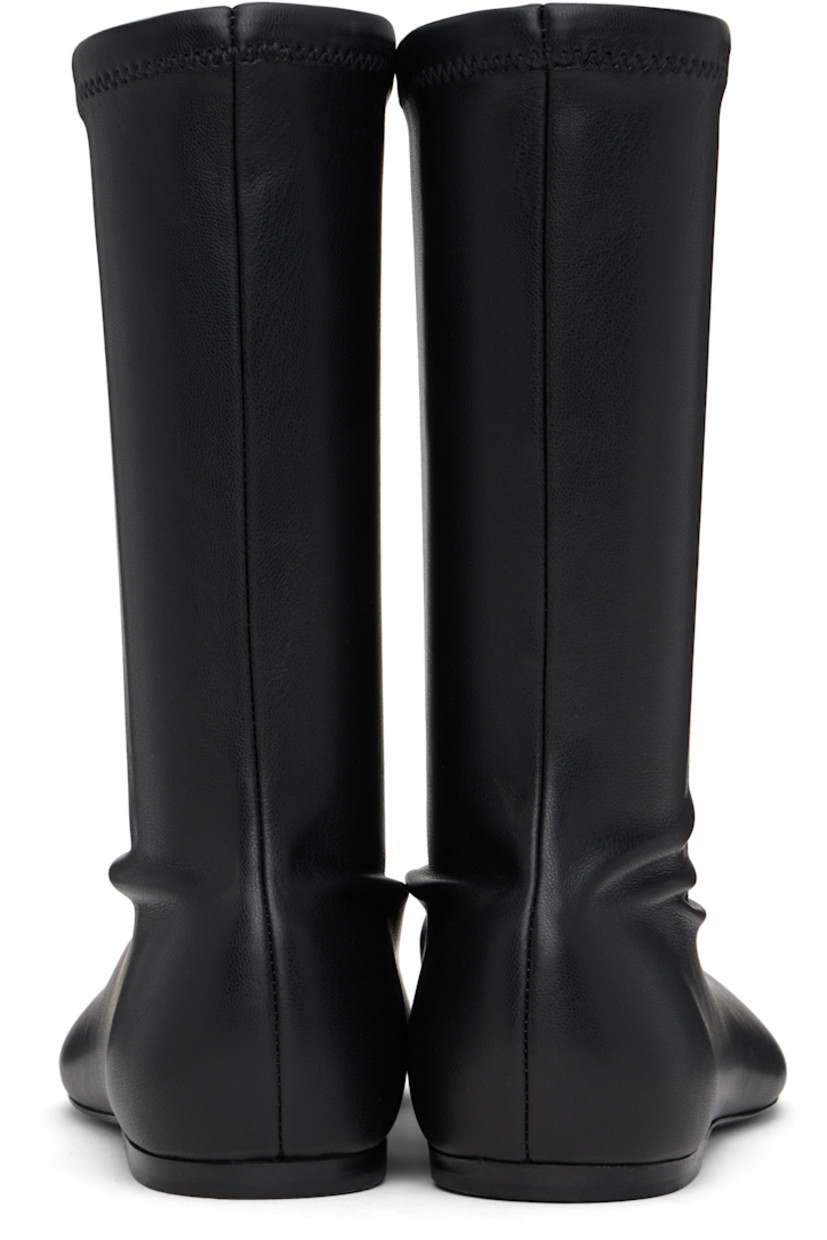 Mid-calf stretch faux-leather slip-on boots in black.

· Faux-suede lining
· Polished faux-leather sole with rubber injection

Supplier color: Black