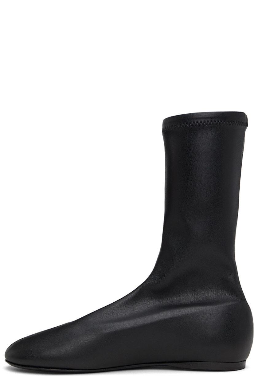 Mid-calf stretch faux-leather slip-on boots in black.

· Faux-suede lining
· Polished faux-leather sole with rubber injection

Supplier color: Black
