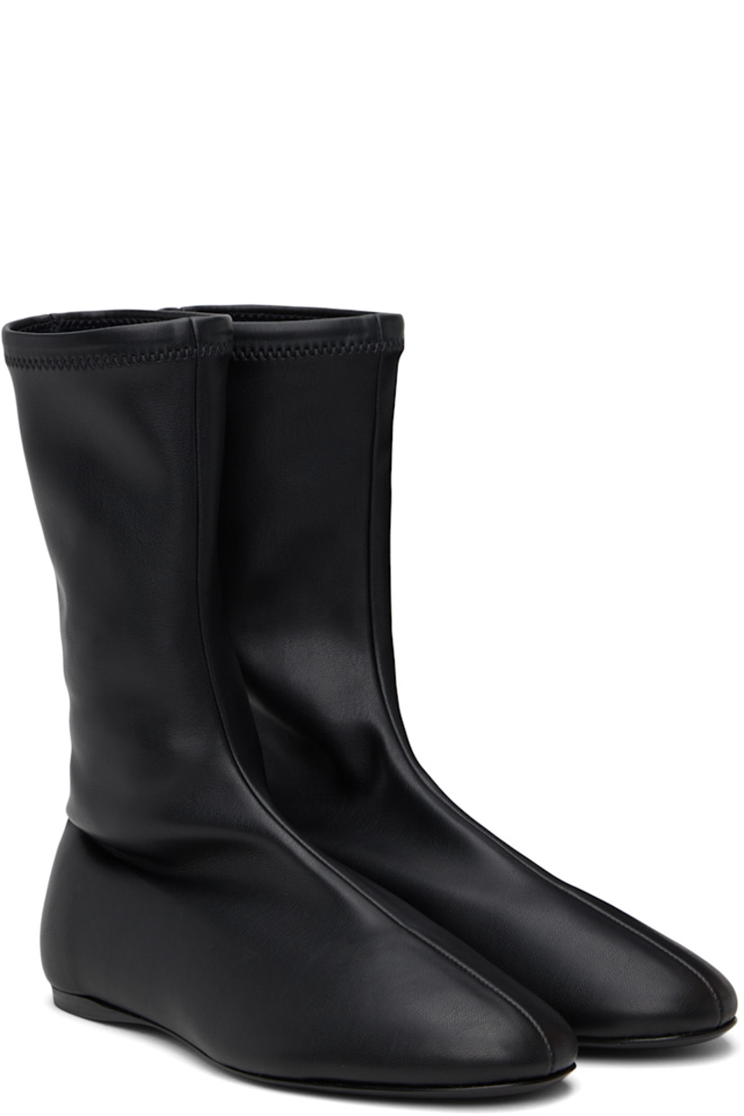 Mid-calf stretch faux-leather slip-on boots in black.

· Faux-suede lining
· Polished faux-leather sole with rubber injection

Supplier color: Black
