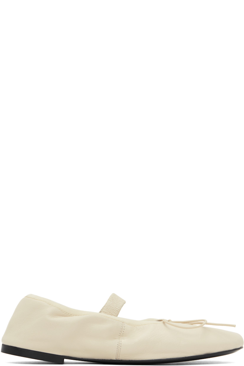 Crinkled leather Mary Jane-style ballerina flats in off-white.

· Self-tie bow accent at vamp
· Elasticized strap and collar
· Logo embossed at grained leather footbed
· Grained leather lining
· Rubber sole

Supplier color: Natural
