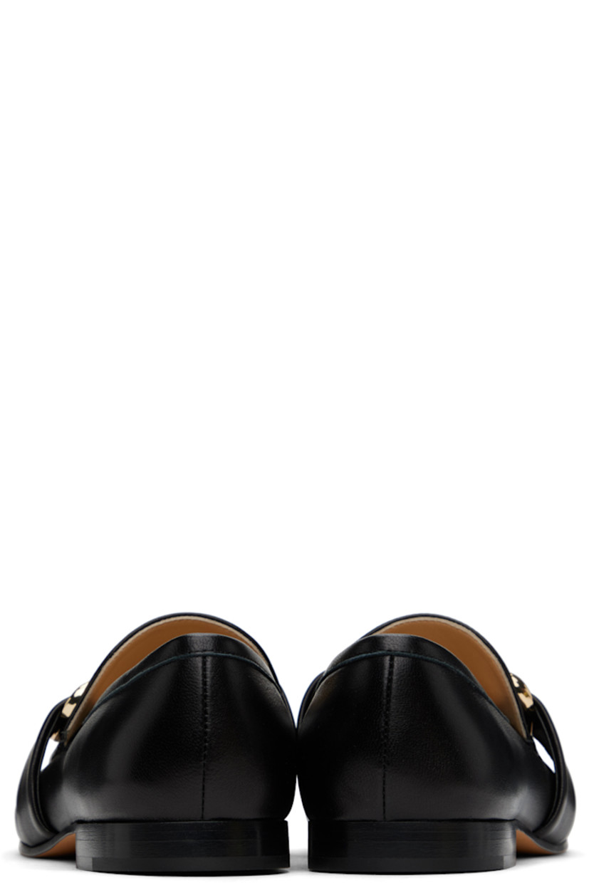 Buffed calfskin loafers in black.

· Strap and logo hardware at vamp
· Buffed calfskin lining
· Stacked leather heel with rubber injection
· Leather sole

Supplier color: Black