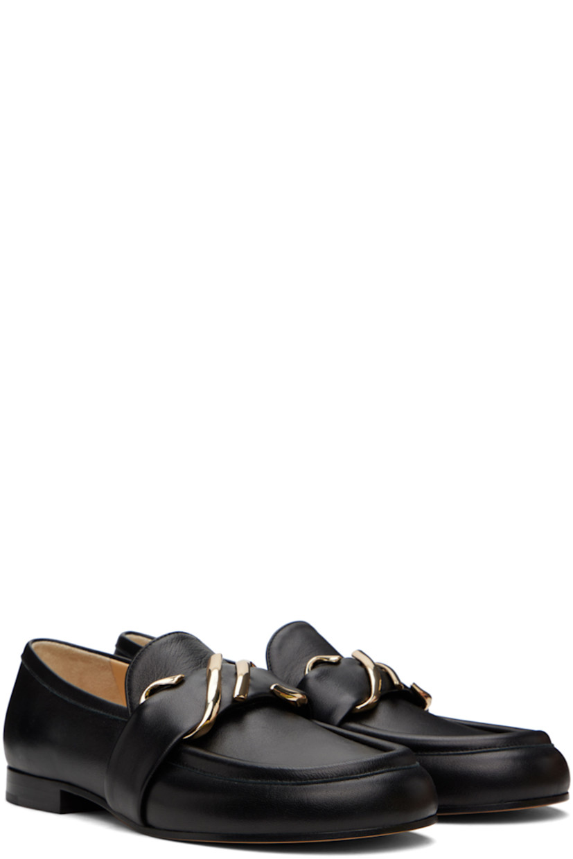 Buffed calfskin loafers in black.

· Strap and logo hardware at vamp
· Buffed calfskin lining
· Stacked leather heel with rubber injection
· Leather sole

Supplier color: Black