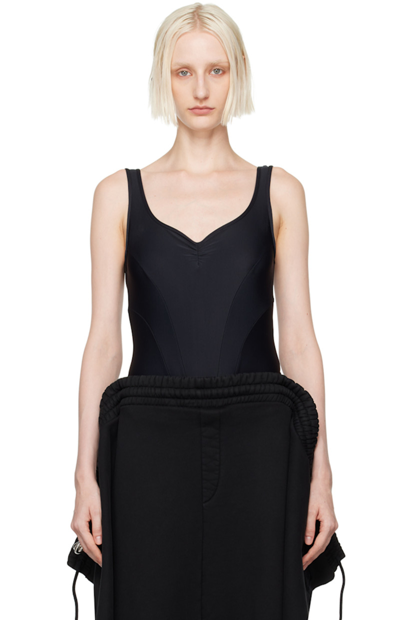 Stretch nylon jersey bodysuit. 

· Paneled construction 
· Scoop neck
· Press-stud fastening at bottom
· Ruching at chest and back
· Logo embroidered at low back 
· Unlined

Supplier color: Black