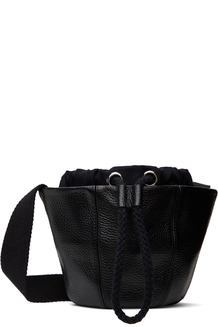 Pebble grained leather messenger bag in black.

· Adjustable crossbody strap
· Drawstring at throat
· Exposed canvas lining 
· H6.5" x W10" x D3"

Supplier color: Black