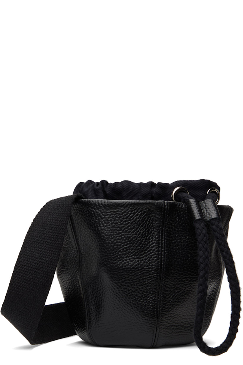 Pebble grained leather messenger bag in black.

· Adjustable crossbody strap
· Drawstring at throat
· Exposed canvas lining 
· H6.5" x W10" x D3"

Supplier color: Black