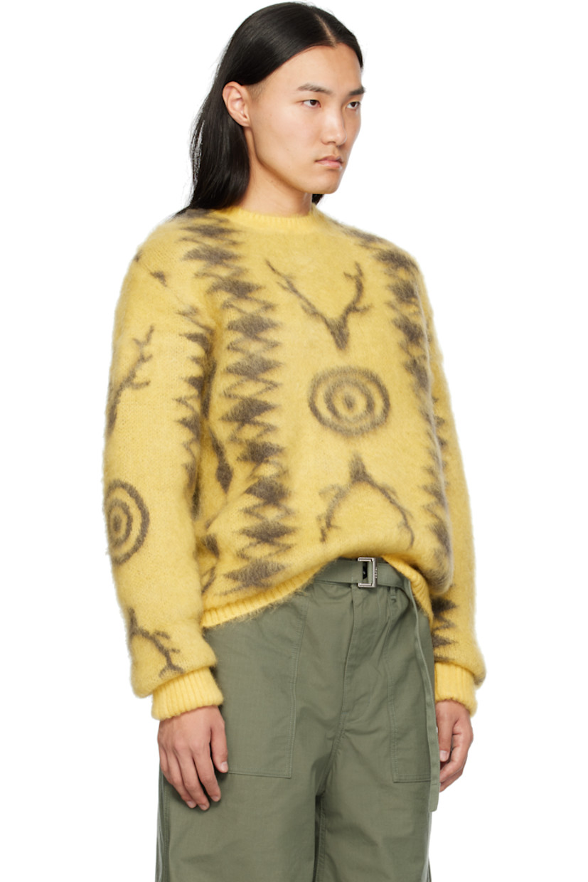 Loose-fit brushed knit mohair-blend sweater. Jacquard graphic pattern throughout.

· Rib knit crewneck, hem, and cuffs
· Dropped shoulders
· Rolled cuffs

Supplier color: Beige