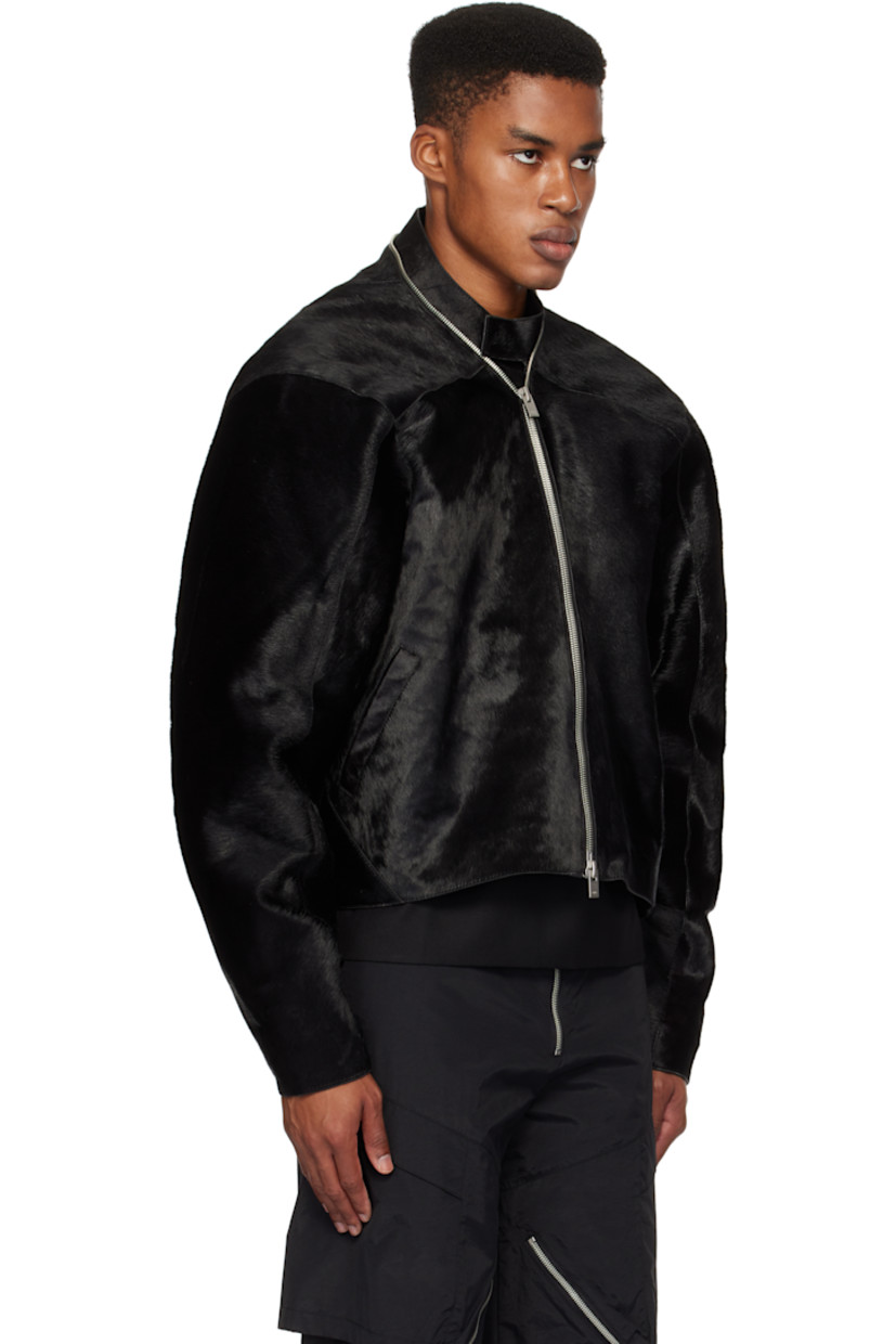Padded hair-on leather jacket.

· Paneled construction
· Band collar
· Two-way zip closure
· Welt pockets
· Press-stud tab at side seams and cuffs
· Welt pocket at interior
· Full canvas lining
· Engraved silver-tone hardware

Supplier color: Black