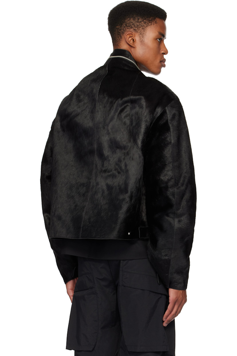 Padded hair-on leather jacket.

· Paneled construction
· Band collar
· Two-way zip closure
· Welt pockets
· Press-stud tab at side seams and cuffs
· Welt pocket at interior
· Full canvas lining
· Engraved silver-tone hardware

Supplier color: Black