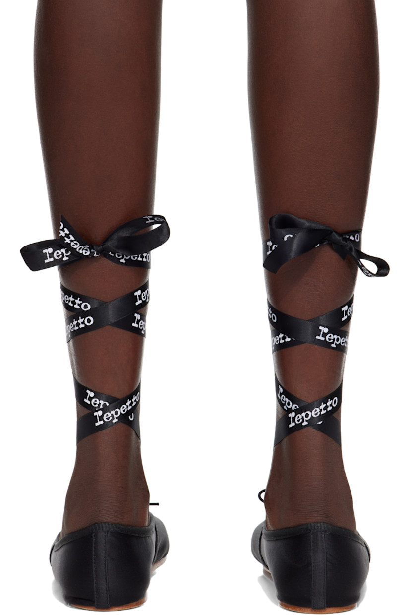 Satin ballerina flats in black.

· Bow accent and grosgrain trim at collar
· Detachable wraparound self-tie ankle straps
· Logo pattern at ankle straps
· Twill lining
· Leather sole

Supplier color: Black