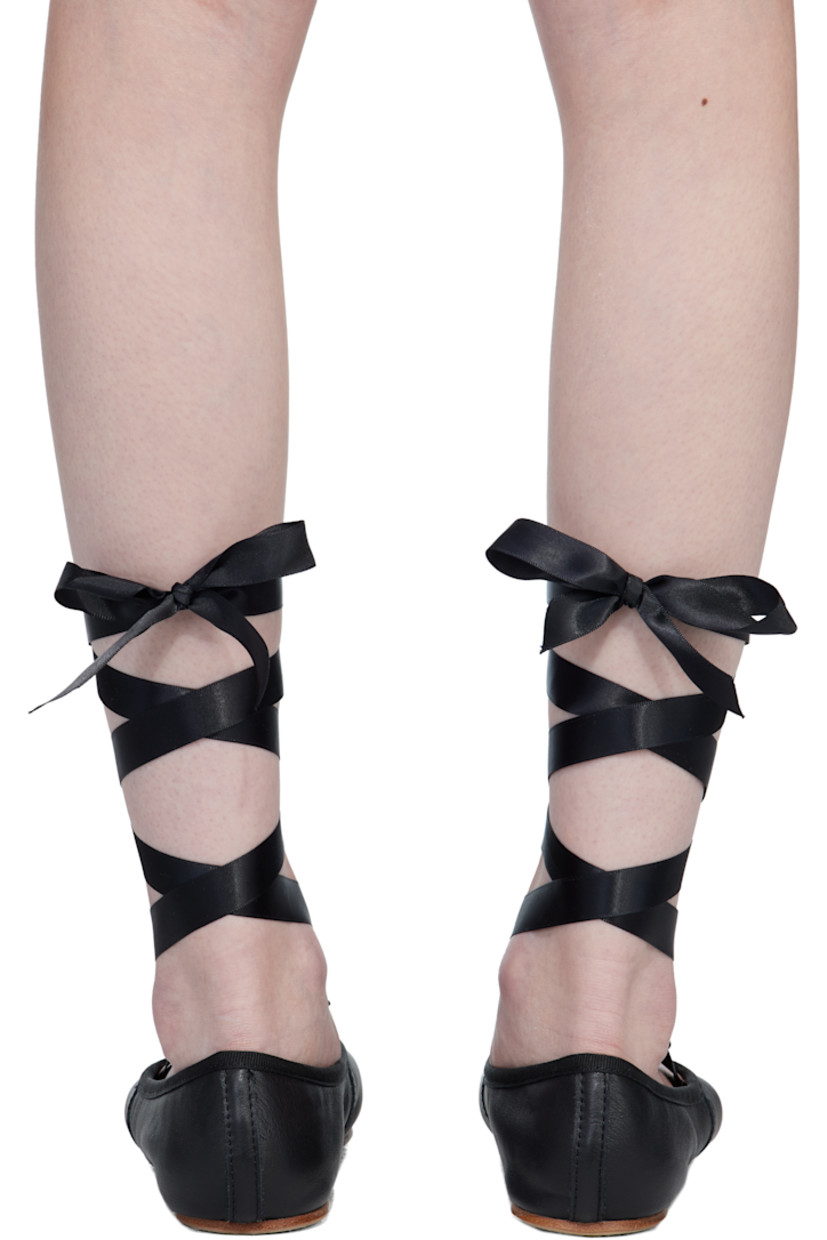 Buffed nappa calfskin ballerina flats.

· Elasticized drawstring and grosgrain trim at collar
· Self-tie satin ankle straps
· Cotton twill lining
· Smooth leather sole

Supplier color: Black