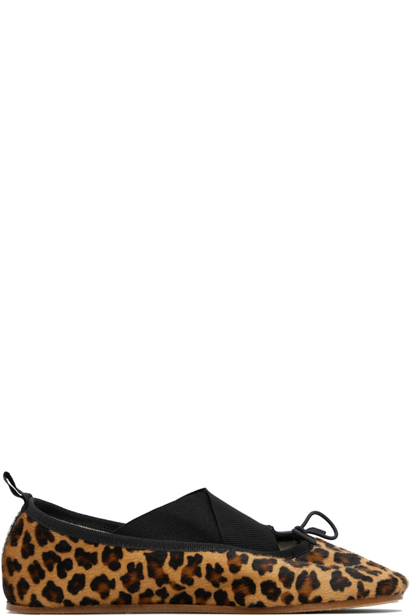 Hair-on leather ballerina flats in tones of brown. 

· Leopard pattern printed throughout
· Bow accent at vamp
· Elasticized crisscrossing straps
· Grosgrain trim at collar and heel
· Logo-printed pull-loop at heel
· Woven cotton lining
· Leather sole

Supplier color: Leopard
