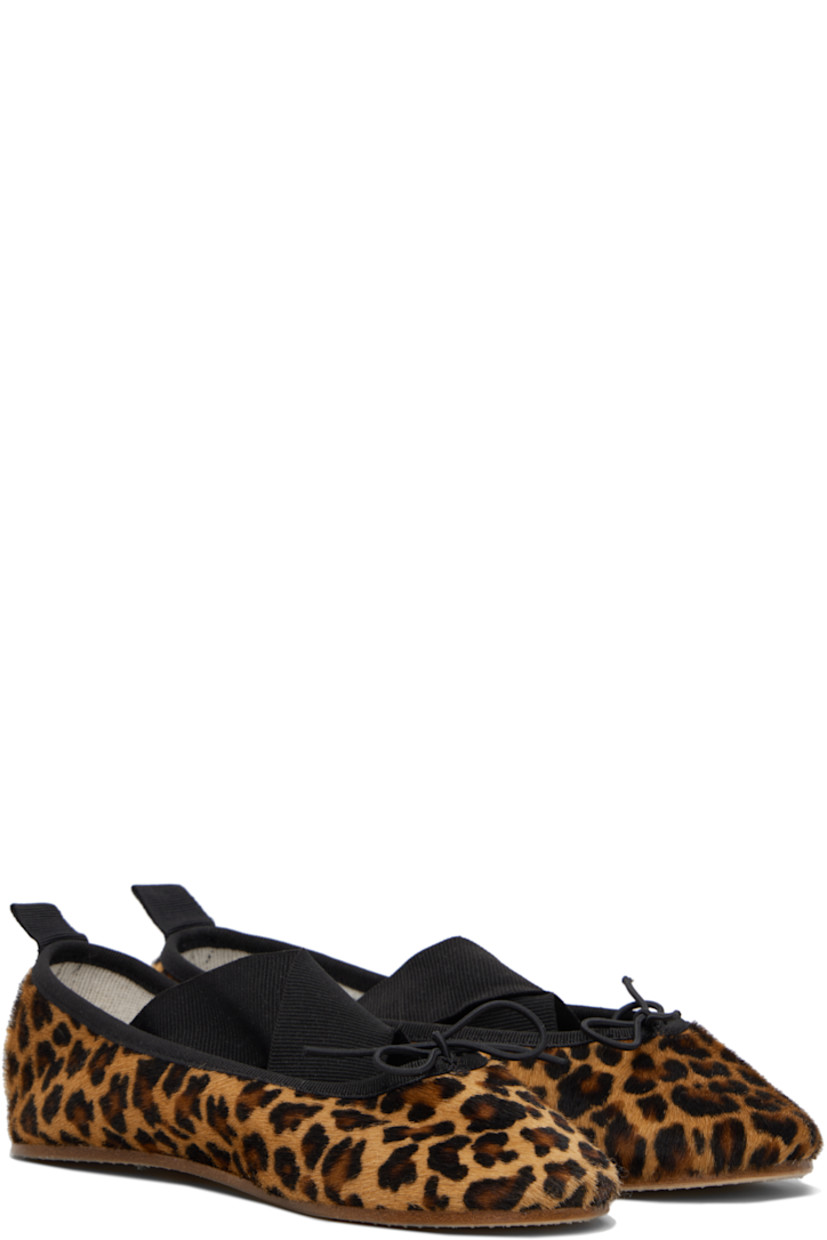 Hair-on leather ballerina flats in tones of brown. 

· Leopard pattern printed throughout
· Bow accent at vamp
· Elasticized crisscrossing straps
· Grosgrain trim at collar and heel
· Logo-printed pull-loop at heel
· Woven cotton lining
· Leather sole

Supplier color: Leopard
