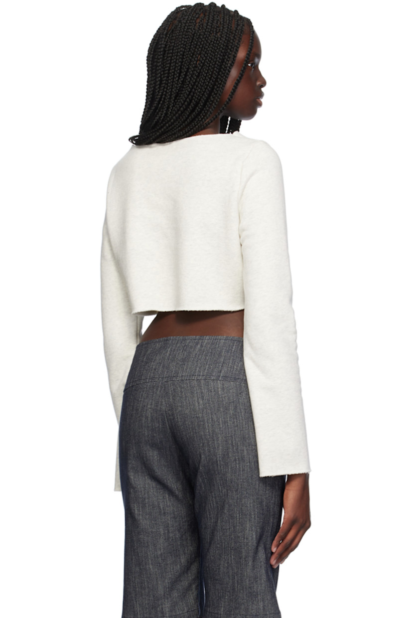 Cotton fleece sweatshirt. Raw edge at boat neck, cropped hem, and cuffs. 

Supplier color: Ash gray