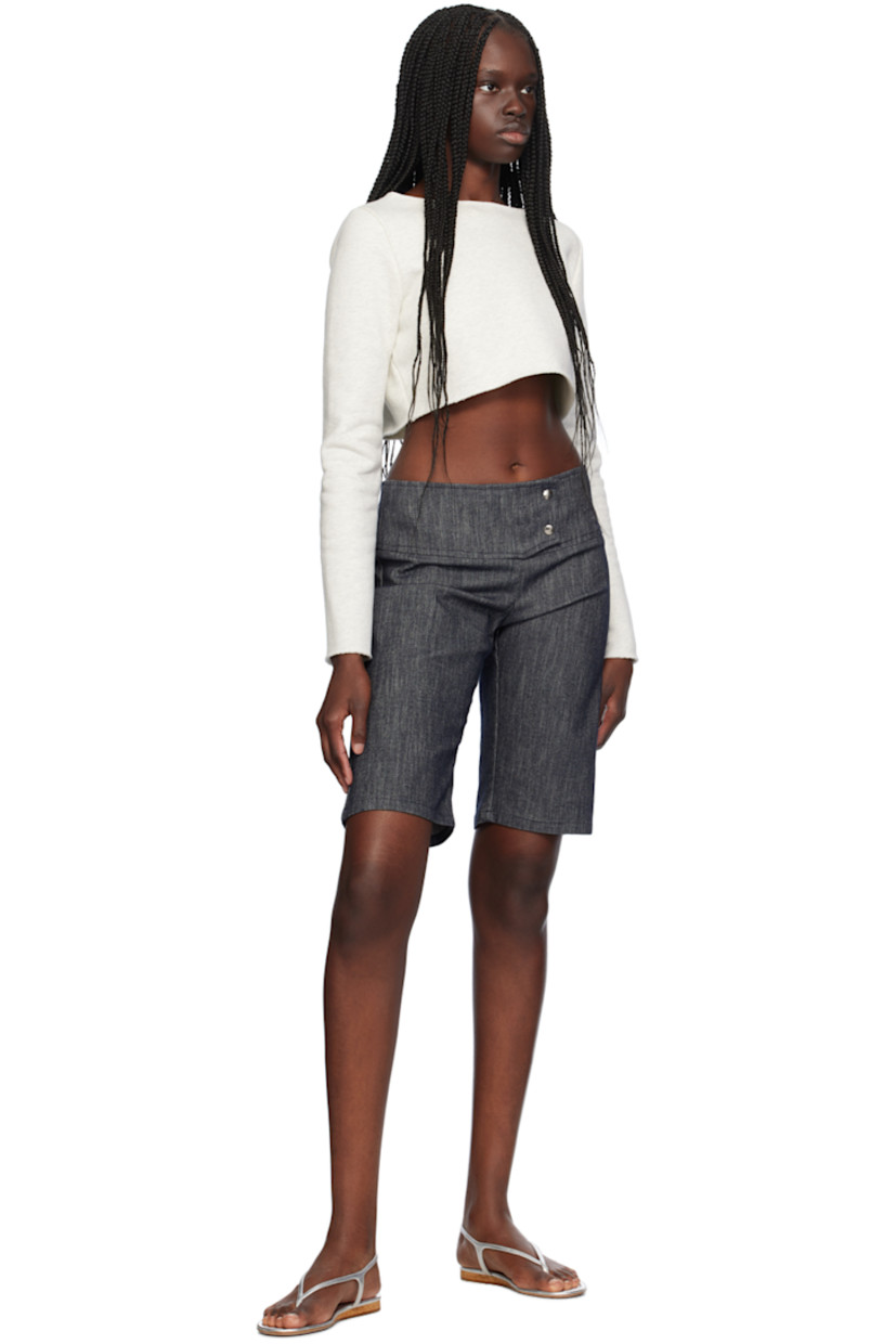 Cotton fleece sweatshirt. Raw edge at boat neck, cropped hem, and cuffs. 

Supplier color: Ash gray