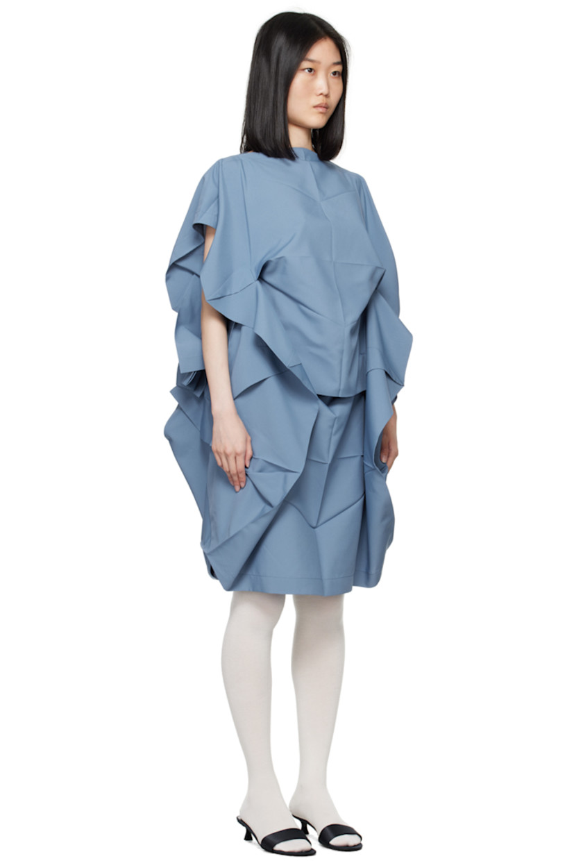 Recycled polyester canvas dress. Creases and draping throughout.

· Layered construction
· Boat neck
· Unlined

Supplier color: Blue
