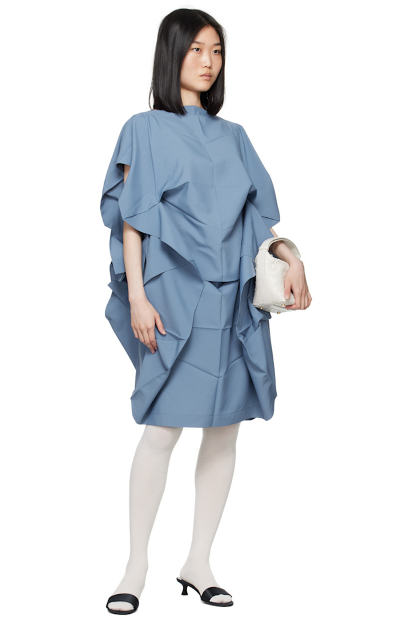 Recycled polyester canvas dress. Creases and draping throughout.

· Layered construction
· Boat neck
· Unlined

Supplier color: Blue
