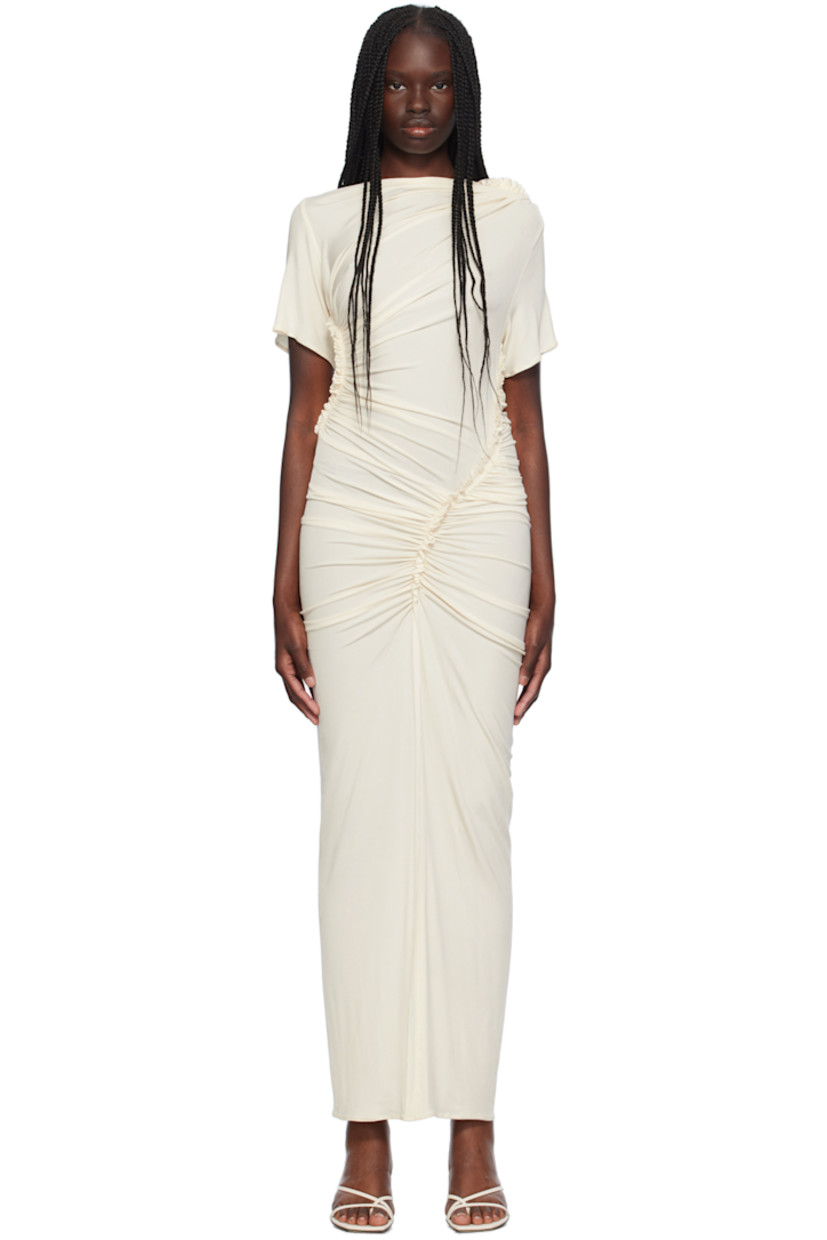 Stretch viscose ribbed jersey dress. Ruching and ruffled trim throughout.

· Asymmetrical construction
· Round neck

Supplier color: Off white