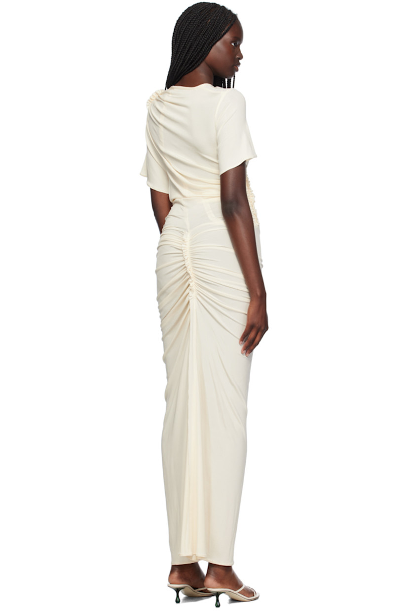 Stretch viscose ribbed jersey dress. Ruching and ruffled trim throughout.

· Asymmetrical construction
· Round neck

Supplier color: Off white