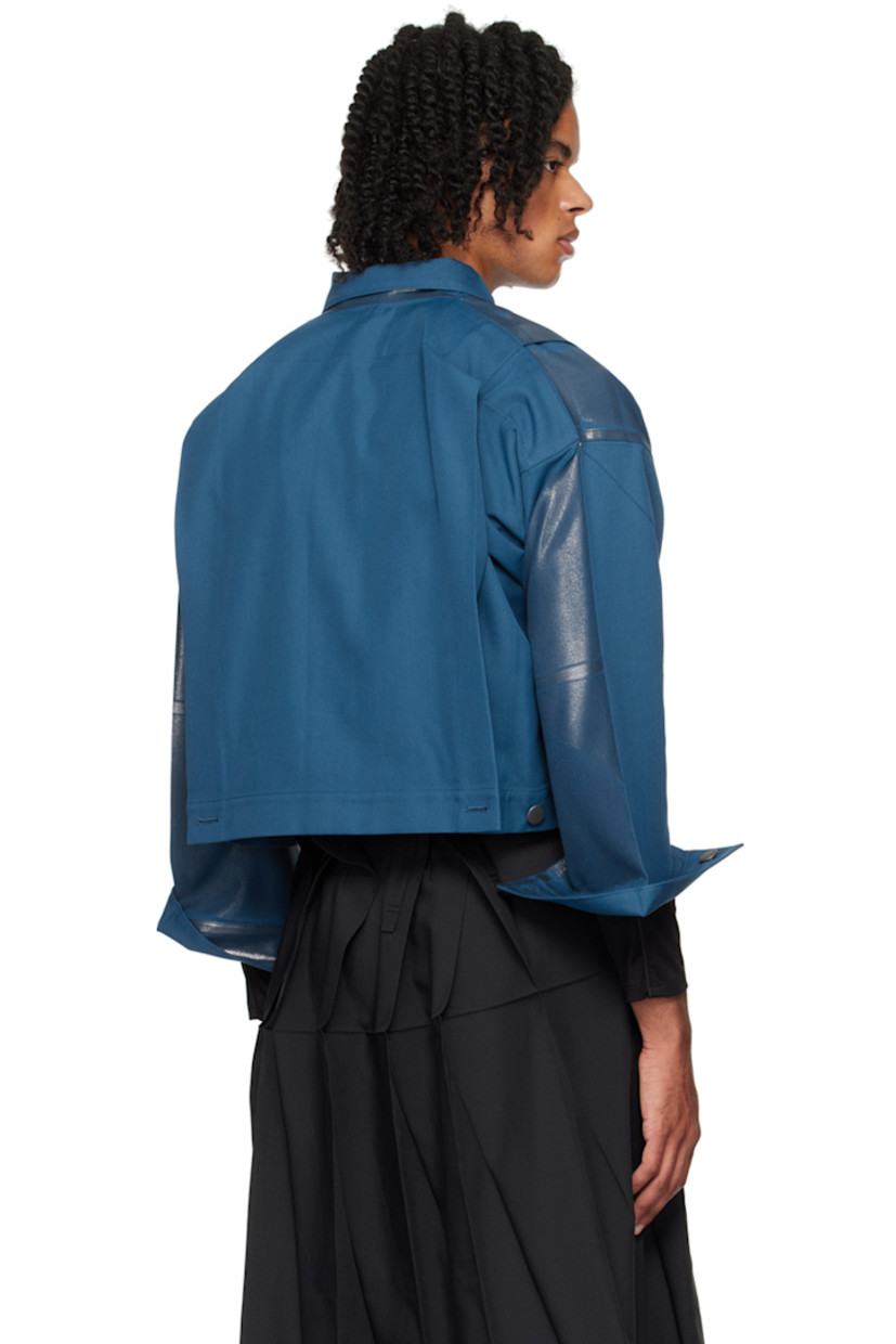 Foil-coated polyester- and cotton-blend twill jacket. Creased detailing throughout.

· Spread collar
· Button closure
· Patch pockets
· Tucks at front and back
· Dropped shoulders
· Single-button barrel cuffs
· Button fastening at back hem

Supplier color: Indigo