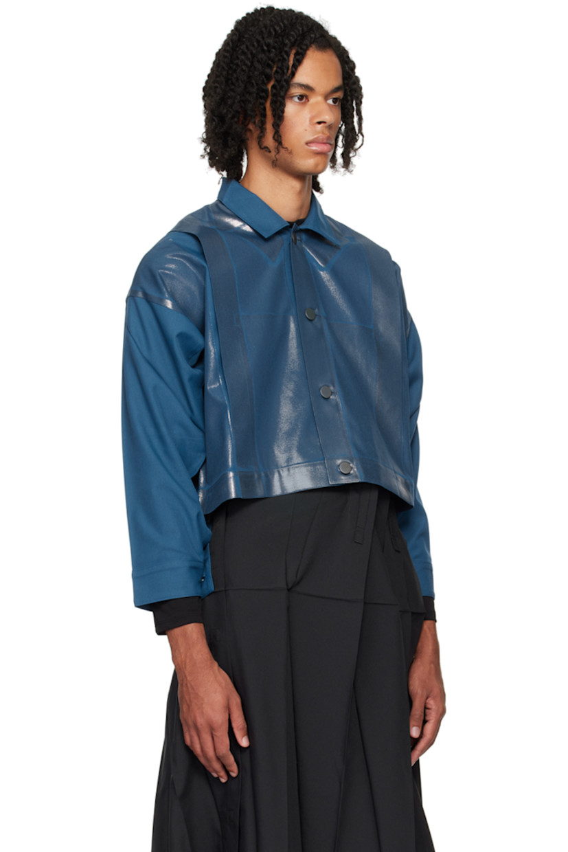 Foil-coated polyester- and cotton-blend twill jacket. Creased detailing throughout.

· Spread collar
· Button closure
· Patch pockets
· Tucks at front and back
· Dropped shoulders
· Single-button barrel cuffs
· Button fastening at back hem

Supplier color: Indigo