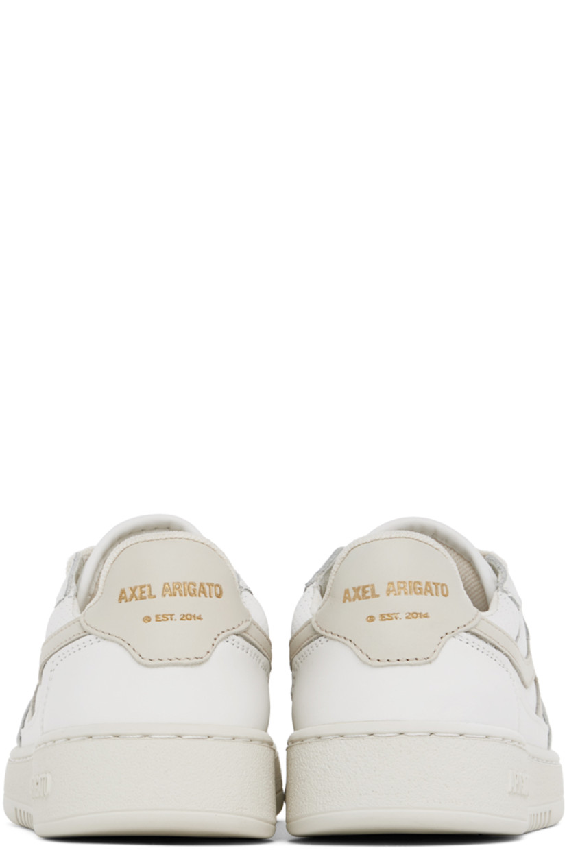 Handcrafted low-top buffed leather and SEAQUAL® YARN canvas sneakers in white and beige.

· Perforated detailing throughout
· Lace-up closure
· Logo patch at padded tongue
· Padded collar
· Logo appliqué at sides
· Logo stamp at outer side and heel tab
· Recycled mesh and faux-suede lining
· Logo embossed at textured rubber midsole
· Treaded rubber sole 

Supplier color: White/Beige