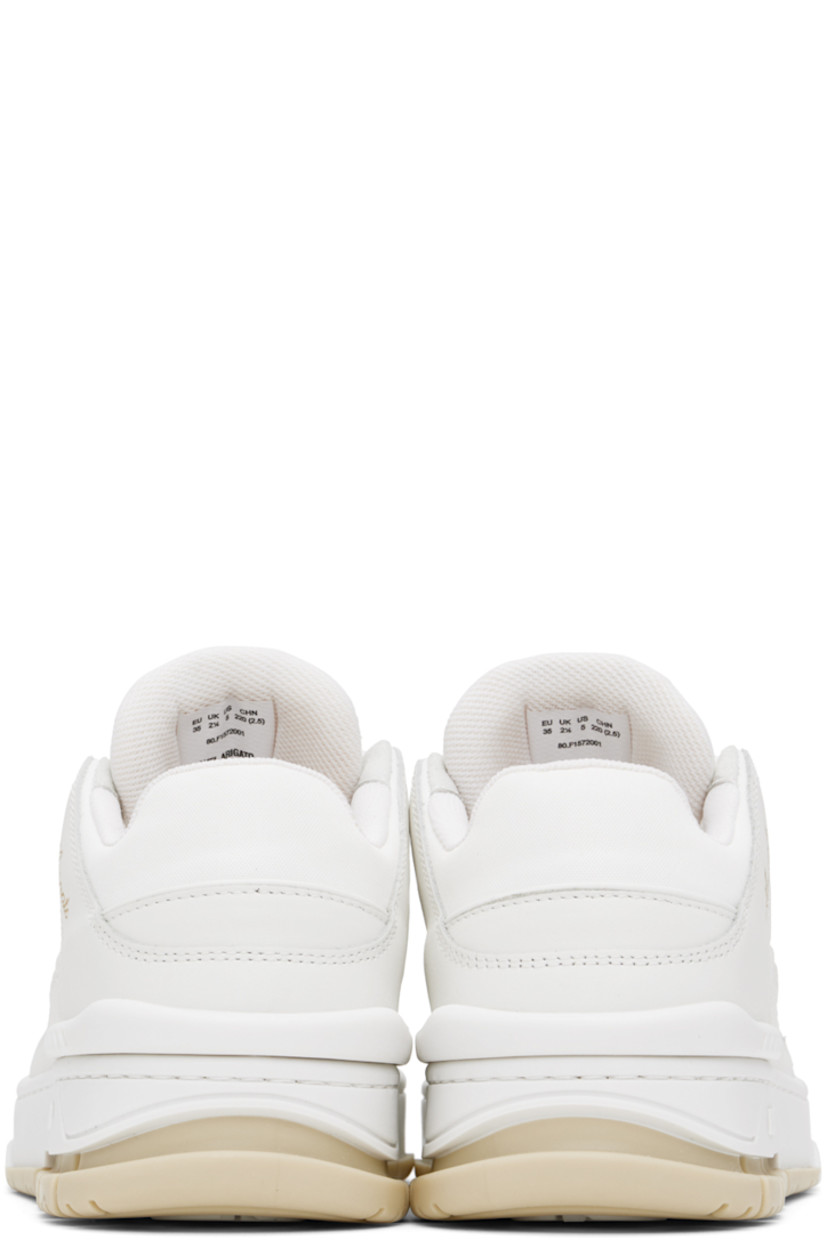 Low-top handcrafted buffed leather and recycled polyester canvas sneakers in white.

· Perforated detailing throughout
· Lace-up closure
· Logo patch at padded tongue
· Gold-tone logo stamp at outer side
· Recycled polyester mesh and faux-suede lining
· TPU heel clip 
· Logo embossed at midsole
· Treaded thermoplastic rubber sole

Supplier color: White/Beige