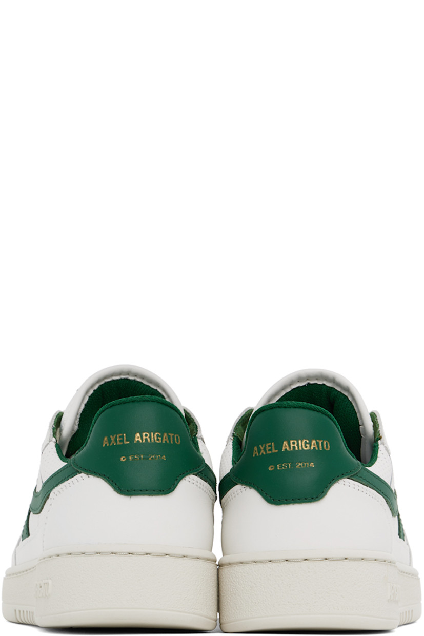 Handcrafted low-top buffed leather and SEAQUAL® YARN canvas sneakers in white and green.

· Perforated detailing throughout
· Lace-up closure
· Logo patch at padded tongue
· Padded collar
· Logo appliqué at sides
· Logo stamp at outer side and heel tab
· Recycled mesh and faux-suede lining
· Logo embossed at textured rubber midsole
· Treaded rubber sole 

Supplier color: White/Green