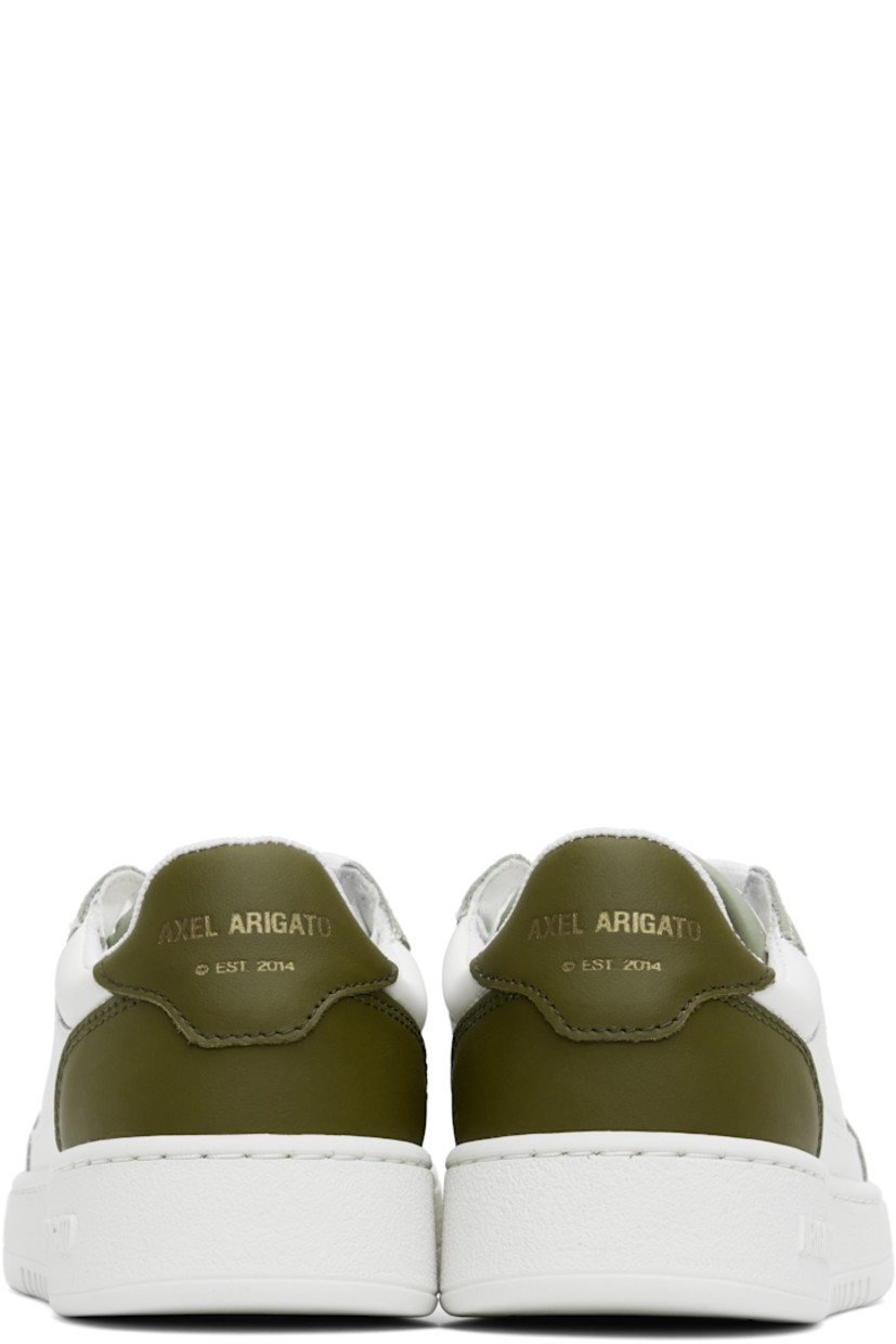 Low-top paneled grained leather sneakers in white and green. 

· Handcrafted
· Perforated detailing throughout
· Lace-up closure
· Logo patch at padded canvas tongue
· Padded collar
· Logo stamp at outer side and heel tab
· Recycled mesh and faux-suede lining
· Logo embossed at textured rubber midsole
· Treaded rubber sole

Supplier color: White/Green