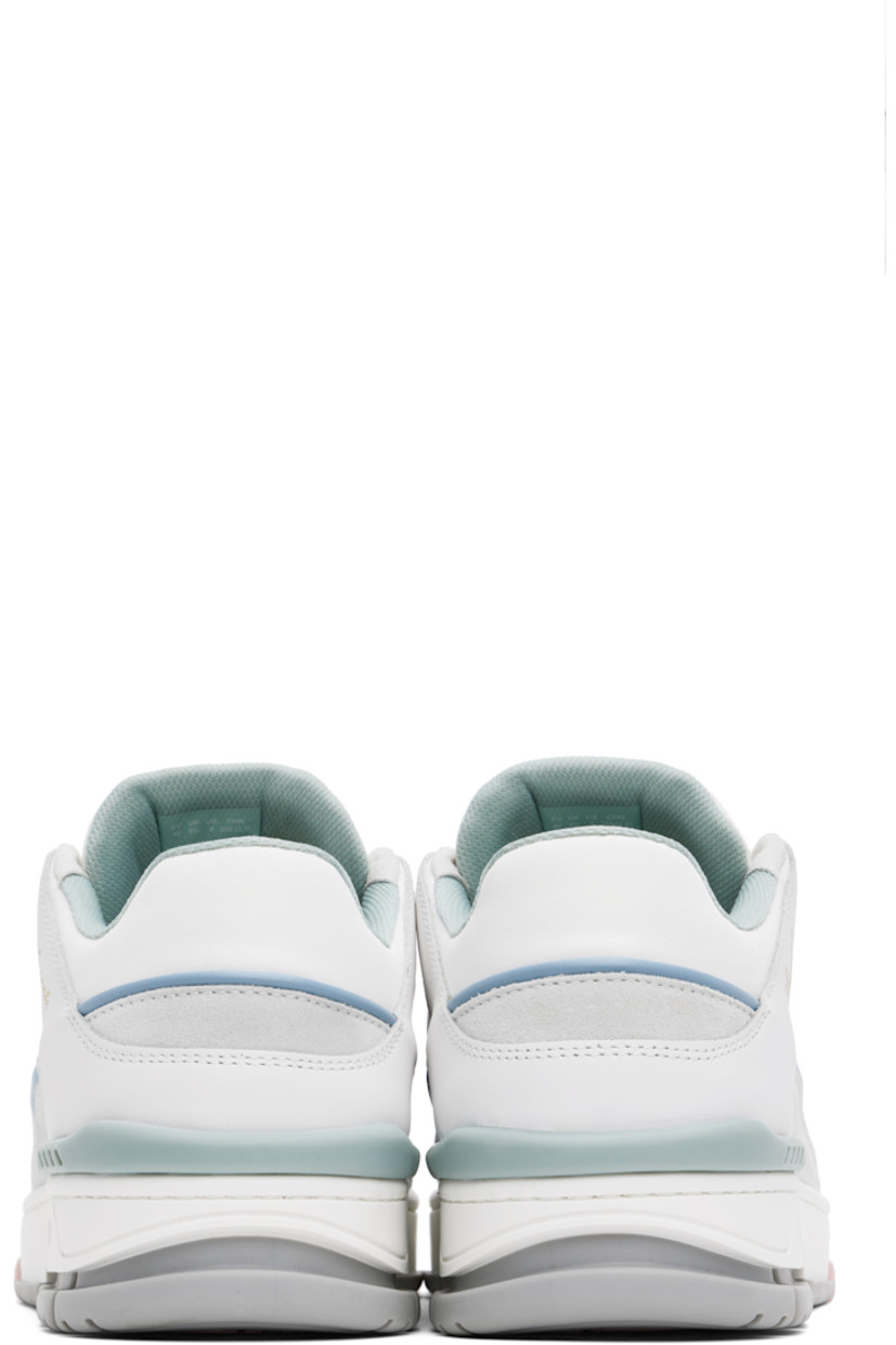 Low-top paneled recycled mesh, buffed leather, and suede sneakers in white and blue.

· Handcrafted
· Perforated detailing throughout
· Lace-up closure
· Logo patch at padded tongue
· Padded collar
· Logo stamp at outer side
· Rubber trim at heel counter
· Recycled mesh and faux-suede lining
· Logo embossed at textured rubber midsole
· Treaded rubber sole

Supplier color: White/Multi