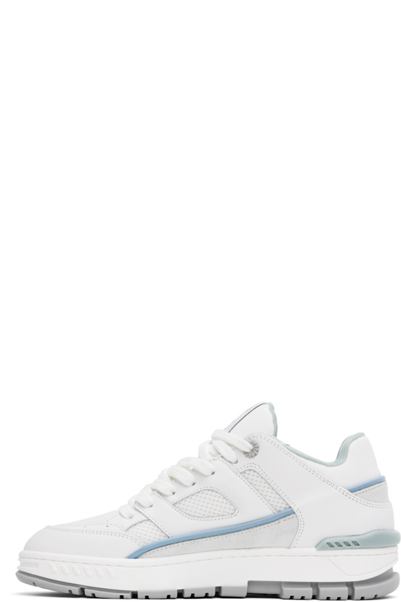 Low-top paneled recycled mesh, buffed leather, and suede sneakers in white and blue.

· Handcrafted
· Perforated detailing throughout
· Lace-up closure
· Logo patch at padded tongue
· Padded collar
· Logo stamp at outer side
· Rubber trim at heel counter
· Recycled mesh and faux-suede lining
· Logo embossed at textured rubber midsole
· Treaded rubber sole

Supplier color: White/Multi