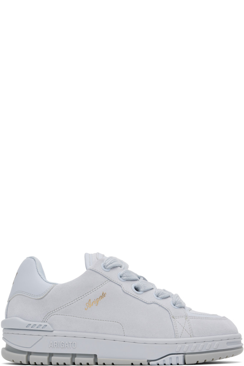 Handcrafted low-top paneled suede and buffed leather sneakers in blue.

· Perforated detailing at toe
· Lace-up closure
· Logo patch at padded tongue
· Padded collar
· Gold-tone logo stamp at outer side
· Logo embossed at heel tab
· Rubber trim at heel counter
· Recycled mesh lining
· Logo embossed at midsole
· Treaded rubber sole

Supplier color: Light blue/Gray