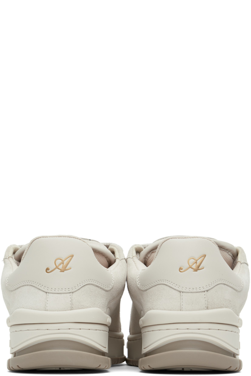 Handcrafted low-top paneled suede and buffed leather sneakers in gray.

· Perforated detailing at toe
· Lace-up closure
· Logo patch at padded tongue
· Padded collar
· Gold-tone logo stamp at outer side
· Logo embossed at heel tab
· Rubber trim at heel counter
· Recycled mesh lining
· Logo embossed at midsole
· Treaded rubber sole

Supplier color: Beige/Beige