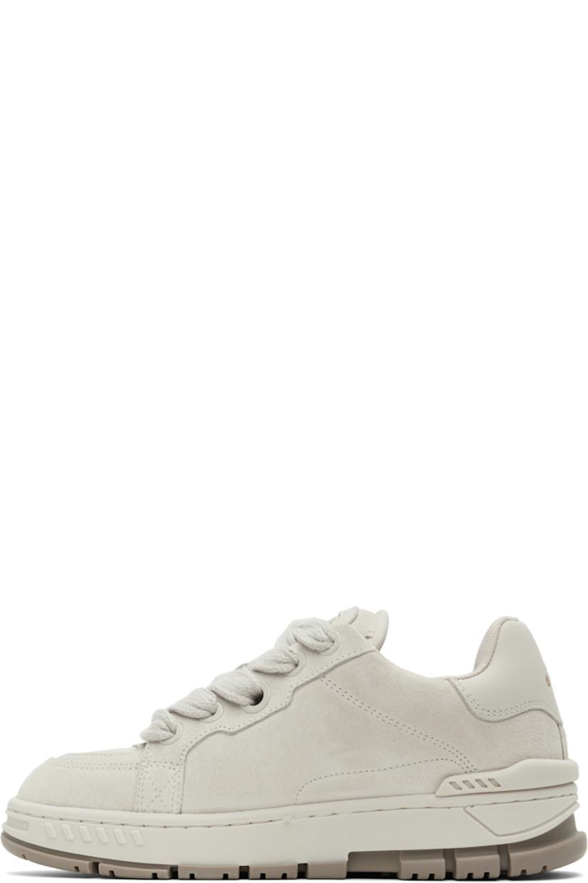 Handcrafted low-top paneled suede and buffed leather sneakers in gray.

· Perforated detailing at toe
· Lace-up closure
· Logo patch at padded tongue
· Padded collar
· Gold-tone logo stamp at outer side
· Logo embossed at heel tab
· Rubber trim at heel counter
· Recycled mesh lining
· Logo embossed at midsole
· Treaded rubber sole

Supplier color: Beige/Beige