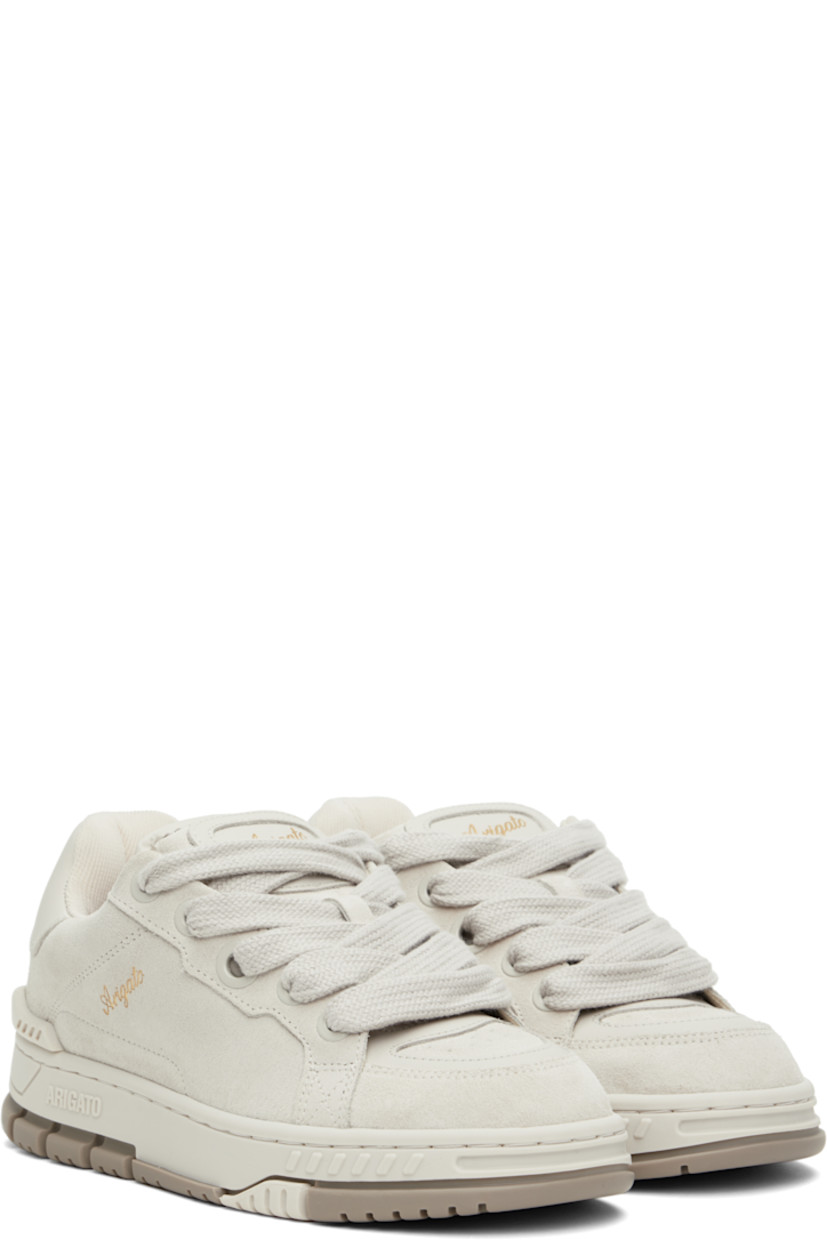 Handcrafted low-top paneled suede and buffed leather sneakers in gray.

· Perforated detailing at toe
· Lace-up closure
· Logo patch at padded tongue
· Padded collar
· Gold-tone logo stamp at outer side
· Logo embossed at heel tab
· Rubber trim at heel counter
· Recycled mesh lining
· Logo embossed at midsole
· Treaded rubber sole

Supplier color: Beige/Beige