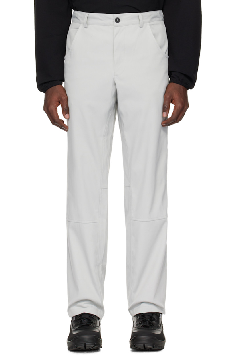 Straight-leg nylon canvas trousers.

· Belt loops at partially elasticized waistband
· Four-pocket styling
· Zip-fly
· Storm flap at back waistband

Supplier color: Pale grey