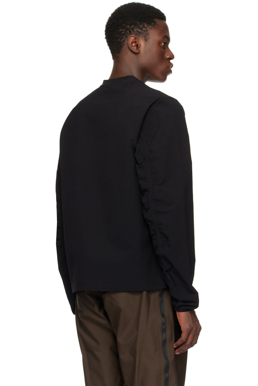 IBQ® Dynamic stretch nylon taffeta sweatshirt.

· Crewneck
· Logo flag at side seam
· Ruching at sleeves
· Elasticized cuffs

Supplier color: Black