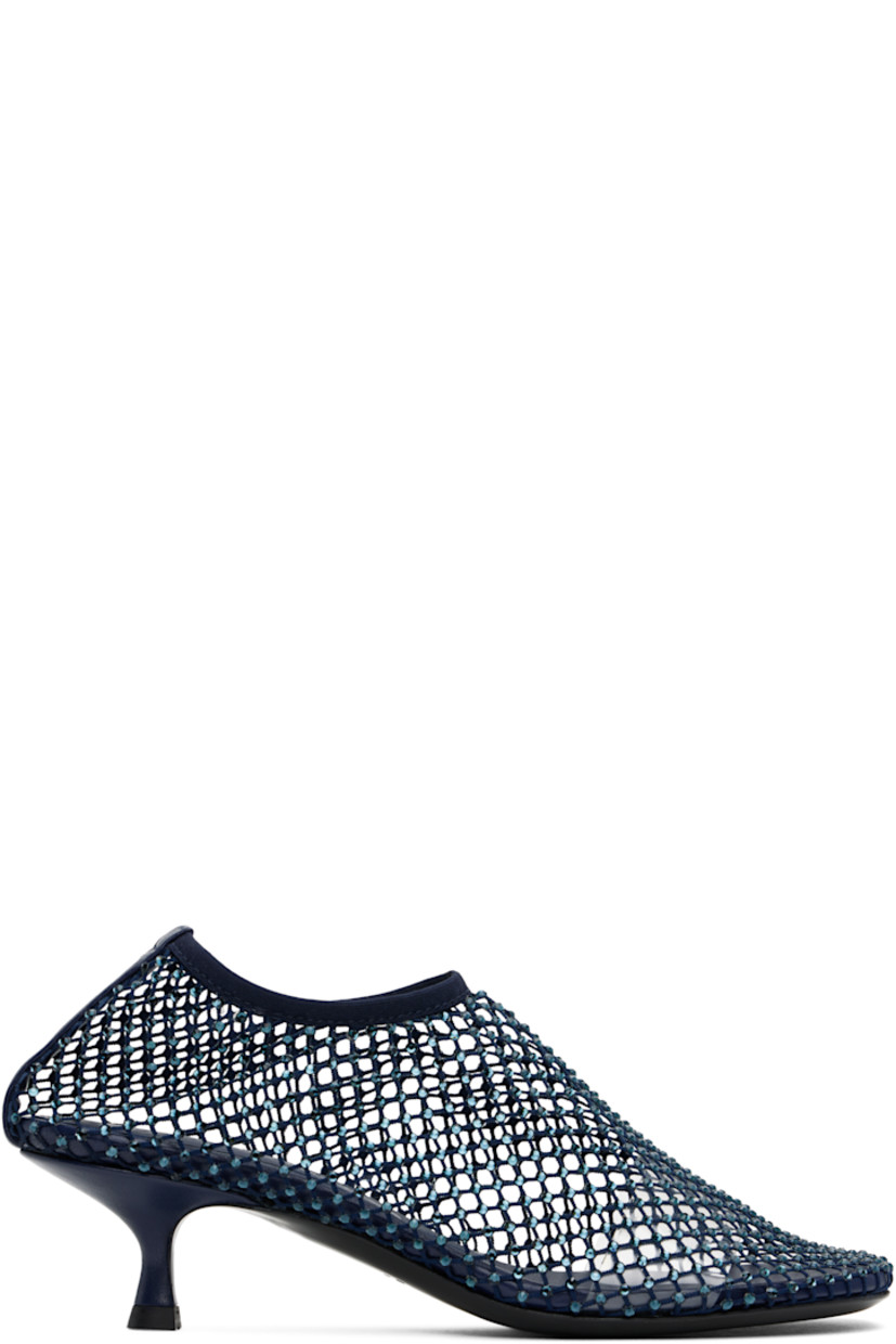 Handcrafted mesh heels in navy.

· Crystal-cut accents throughout
· Square toe
· Elasticized collar
· Logo embossed at padded leather footbed
· Covered kitten heel with rubber injection
· Polished leather sole
· Heel: H1.75"

Supplier color: Blue graphite