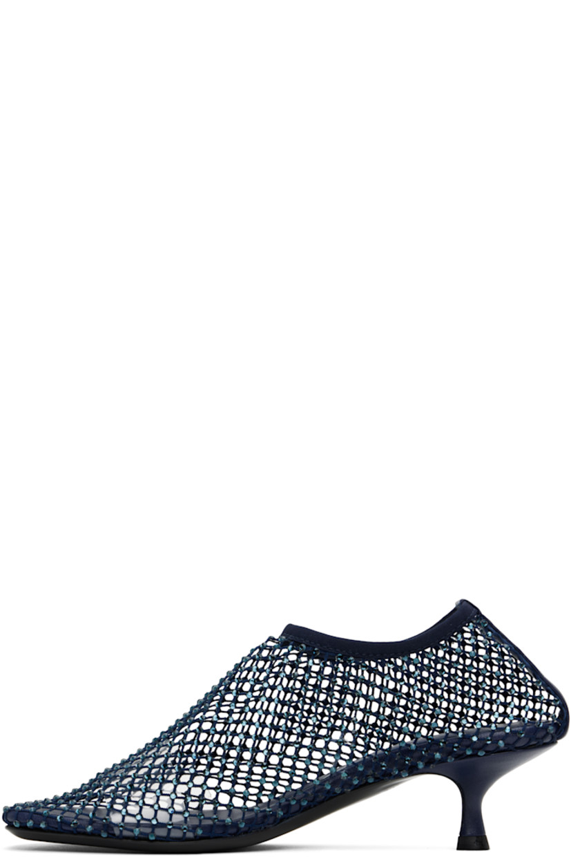 Handcrafted mesh heels in navy.

· Crystal-cut accents throughout
· Square toe
· Elasticized collar
· Logo embossed at padded leather footbed
· Covered kitten heel with rubber injection
· Polished leather sole
· Heel: H1.75"

Supplier color: Blue graphite