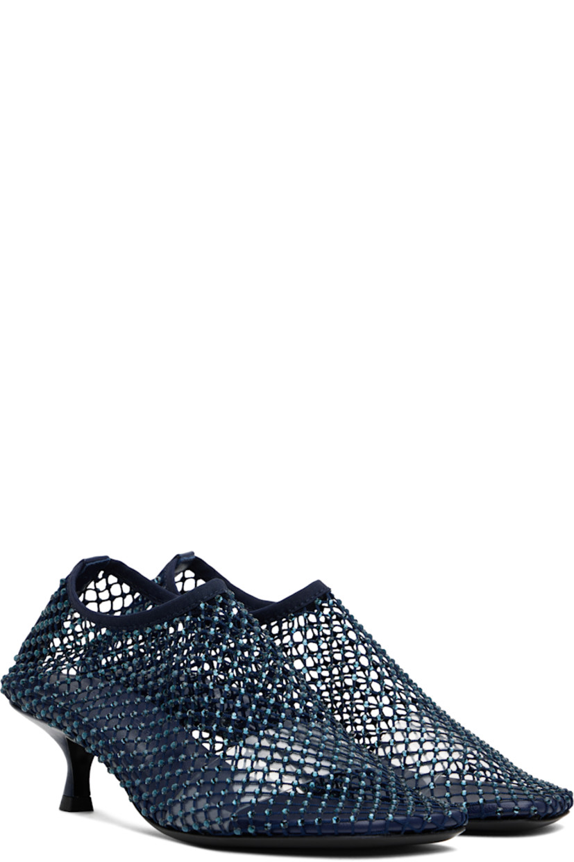 Handcrafted mesh heels in navy.

· Crystal-cut accents throughout
· Square toe
· Elasticized collar
· Logo embossed at padded leather footbed
· Covered kitten heel with rubber injection
· Polished leather sole
· Heel: H1.75"

Supplier color: Blue graphite