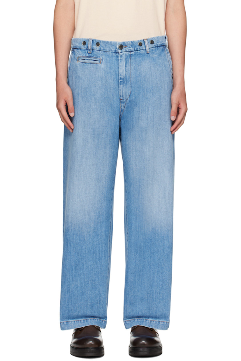 Handcrafted straight-leg non-stretch denim jeans. Fading and distressing throughout. 

· Mid-rise
· Belt loops
· Five-pocket styling
· Zip-fly
· Buttons at front
· Adjustable button-tabs at back waistband
· Contrast stitching in tan 

Supplier color: Stone