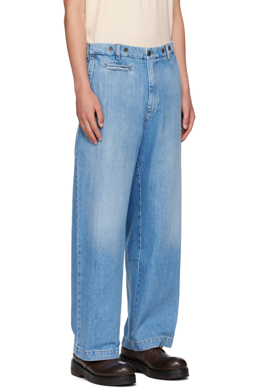 Handcrafted straight-leg non-stretch denim jeans. Fading and distressing throughout. 

· Mid-rise
· Belt loops
· Five-pocket styling
· Zip-fly
· Buttons at front
· Adjustable button-tabs at back waistband
· Contrast stitching in tan 

Supplier color: Stone