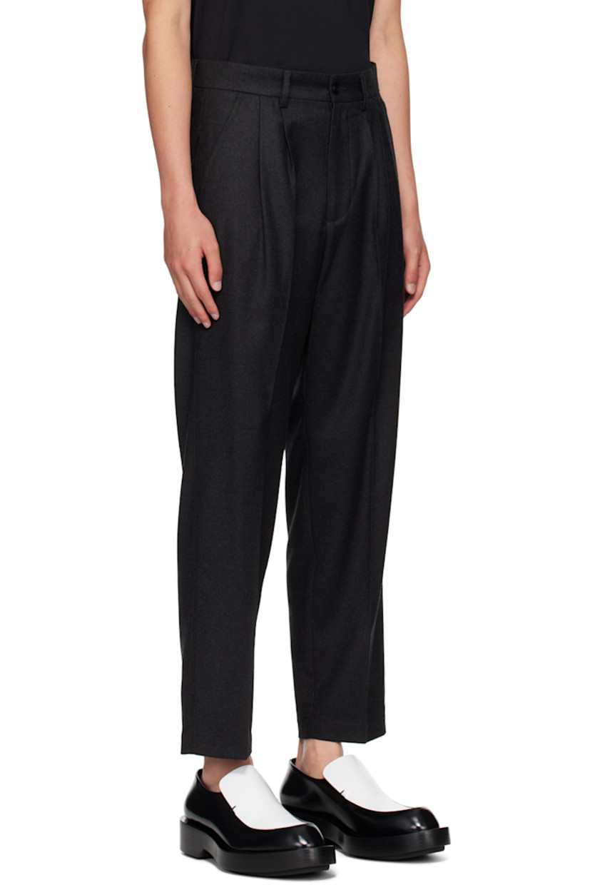 Handcrafted stretch virgin wool twill trousers. 

· Mid-rise
· Belt loops
· Four-pocket styling 
· Zip-fly
· Pleats at front
· Central crease at front and back legs

Supplier color: Antracite
