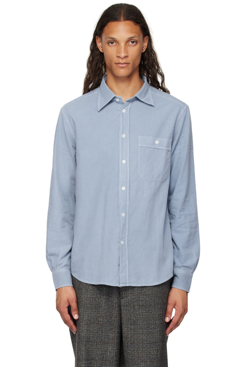 Oversized lightweight cotton flannel shirt.

· Spread collar
· Button closure
· Patch pocket at chest
· Shirttail hem
· Dropped shoulders
· Single-button barrel cuffs
· Mother-of-pearl hardware 

Supplier color: Indaco