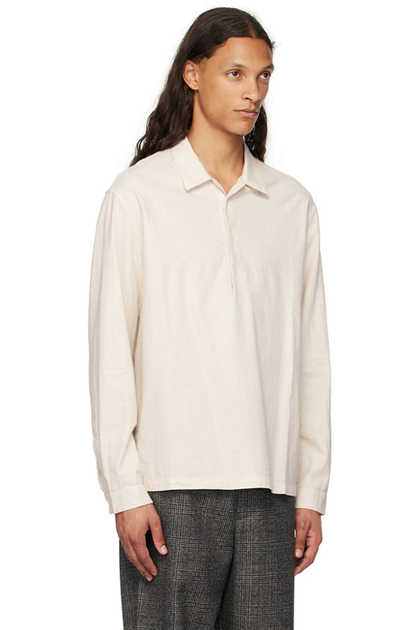 Lightweight cotton flannel shirt. 

· Open spread collar
· Three-button placket
· Tennis-tail hem
· Single-button barrel cuffs
· Mother-of-pearl hardware

Supplier color: Naturale