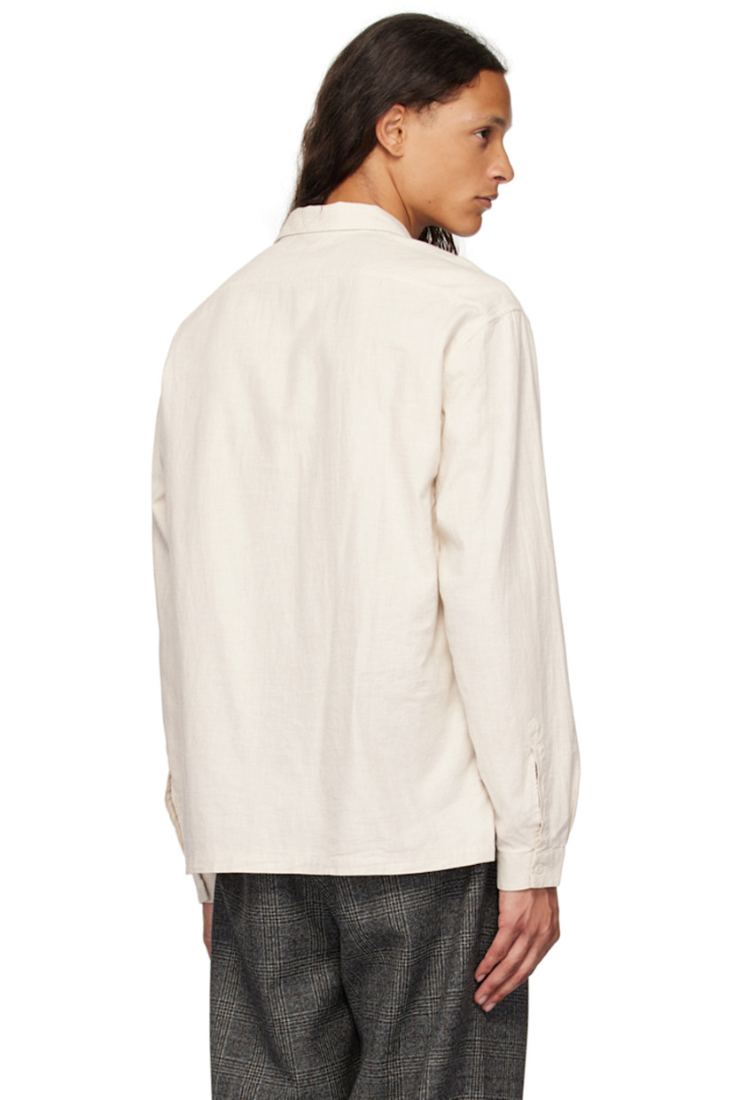 Lightweight cotton flannel shirt. 

· Open spread collar
· Three-button placket
· Tennis-tail hem
· Single-button barrel cuffs
· Mother-of-pearl hardware

Supplier color: Naturale